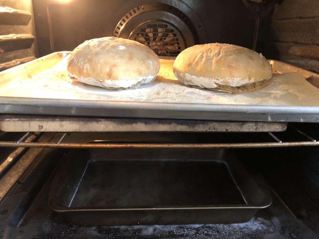 You can see the Steam rising from the baking pan on the bottom and the Bread Baking on top.